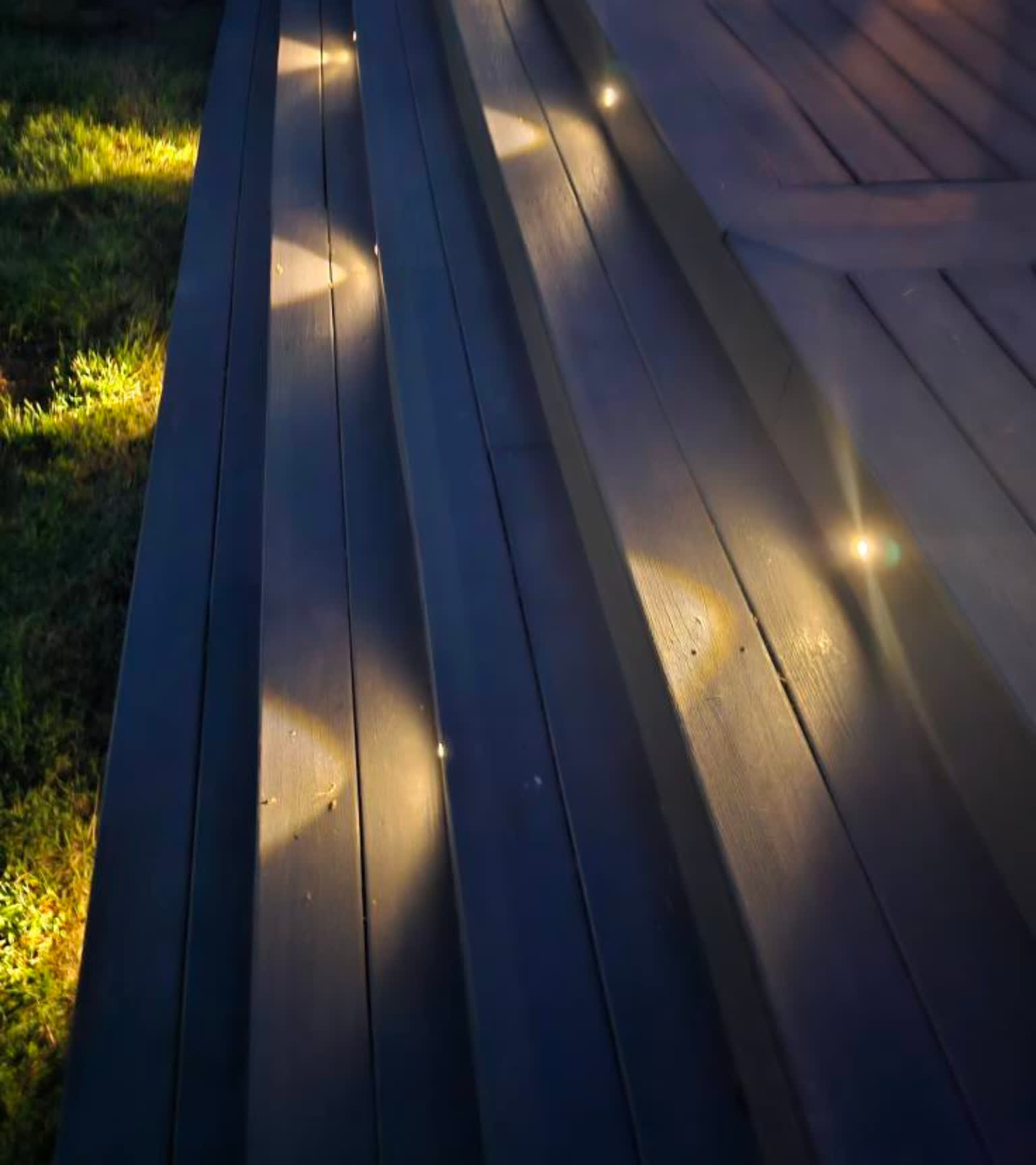 Low-voltage step and path lighting detail on a Melbourne Florida deck