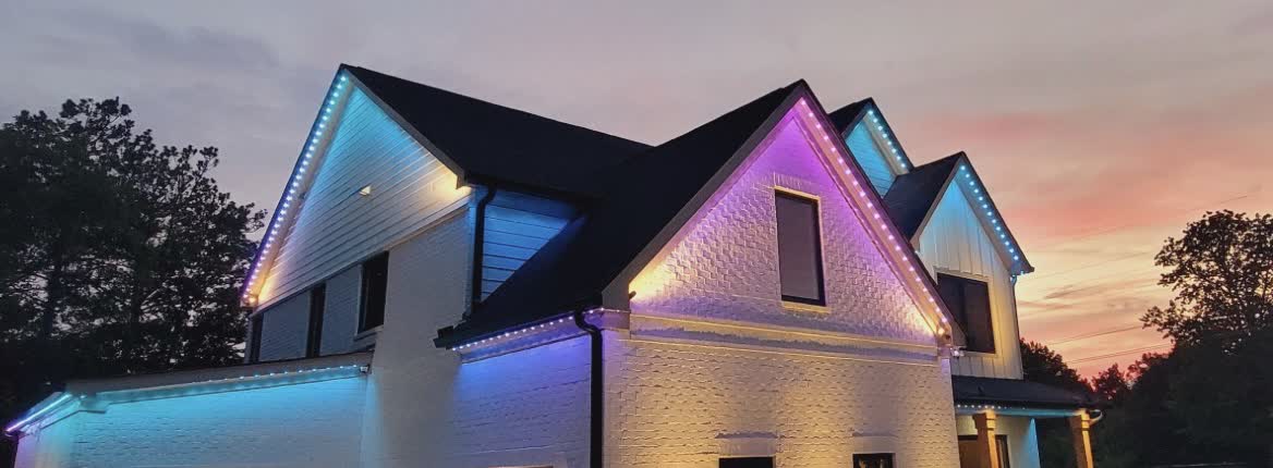 Melbourne FL rooflines with color-changing permanent RGB Christmas light installation